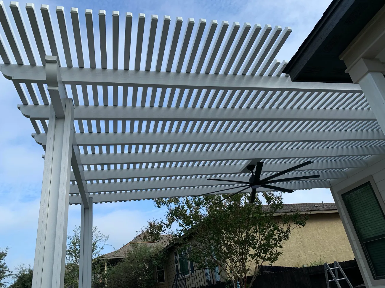 close up of white pergola slats