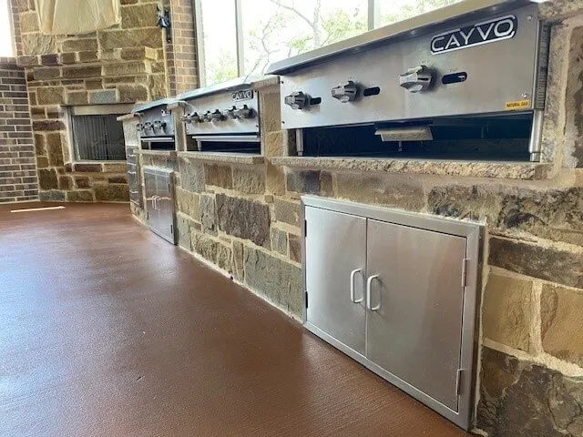 Outdoor kitchen with stone grills