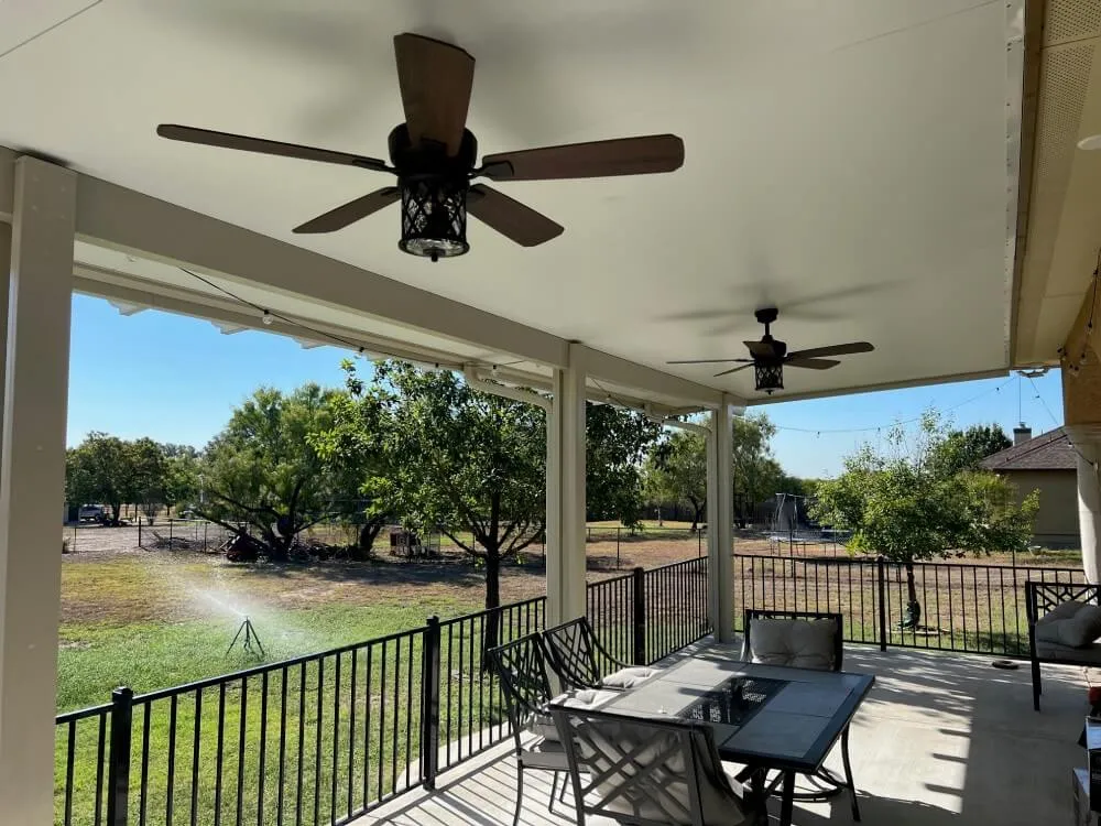 Covered patio with fans and outdoor seating, San Antonio.