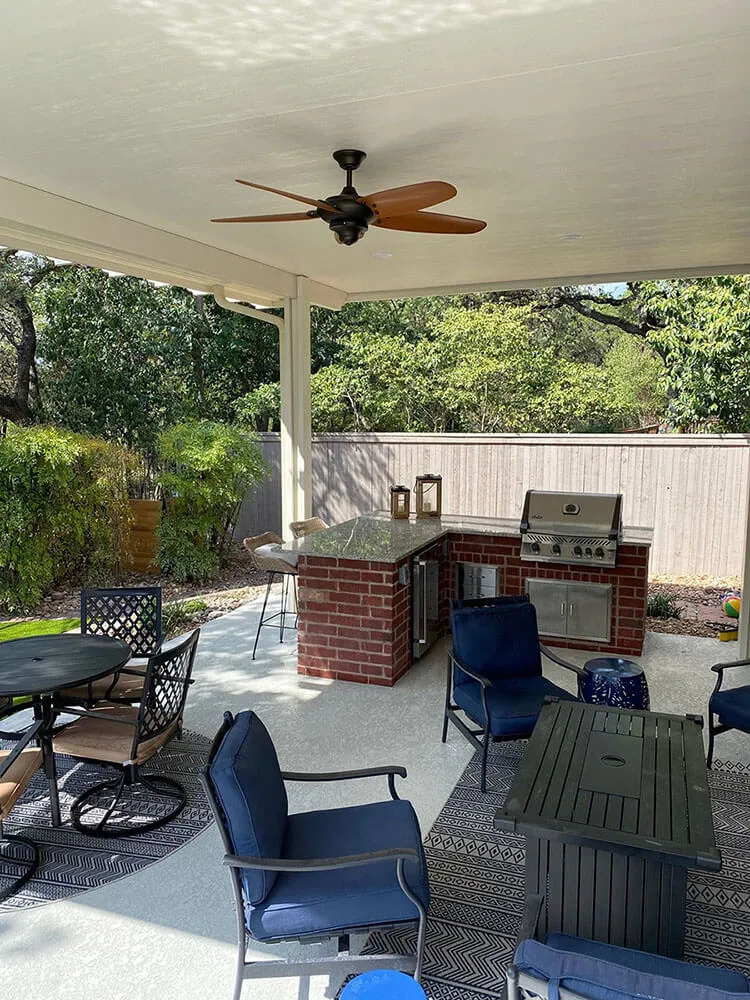 Covered patio with outdoor kitchen in San Antonio.