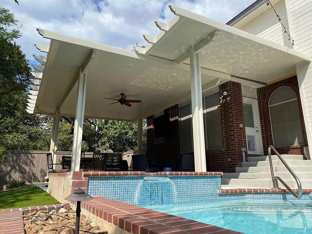 Modern pergola patio cover near a pool.