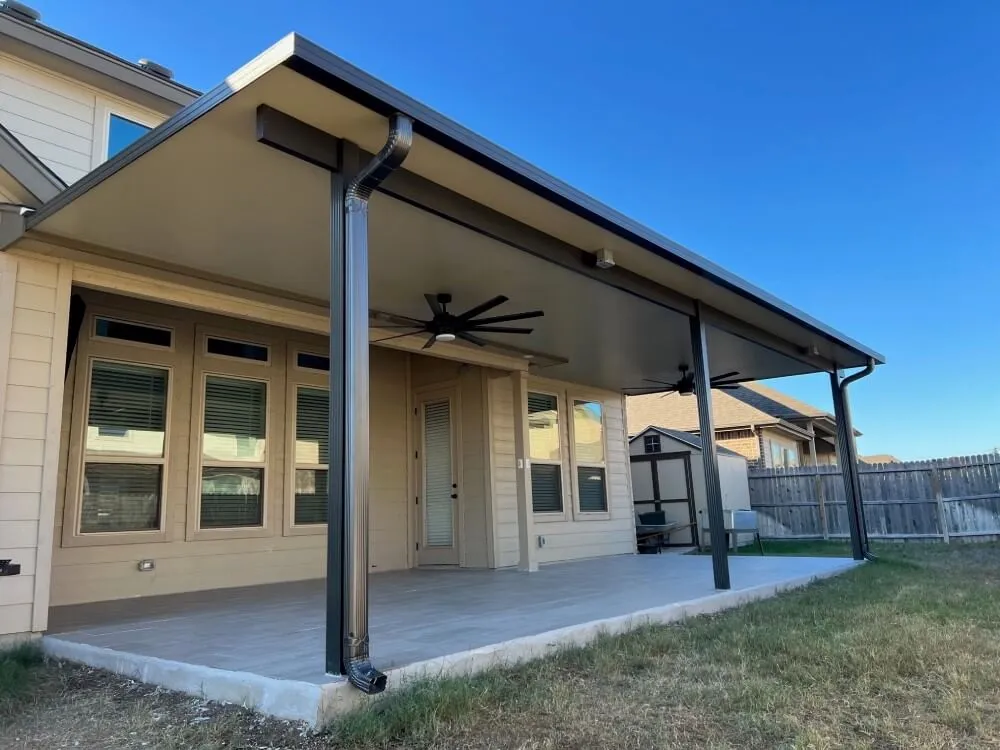 Patio cover with ceiling fan, San Antonio home.