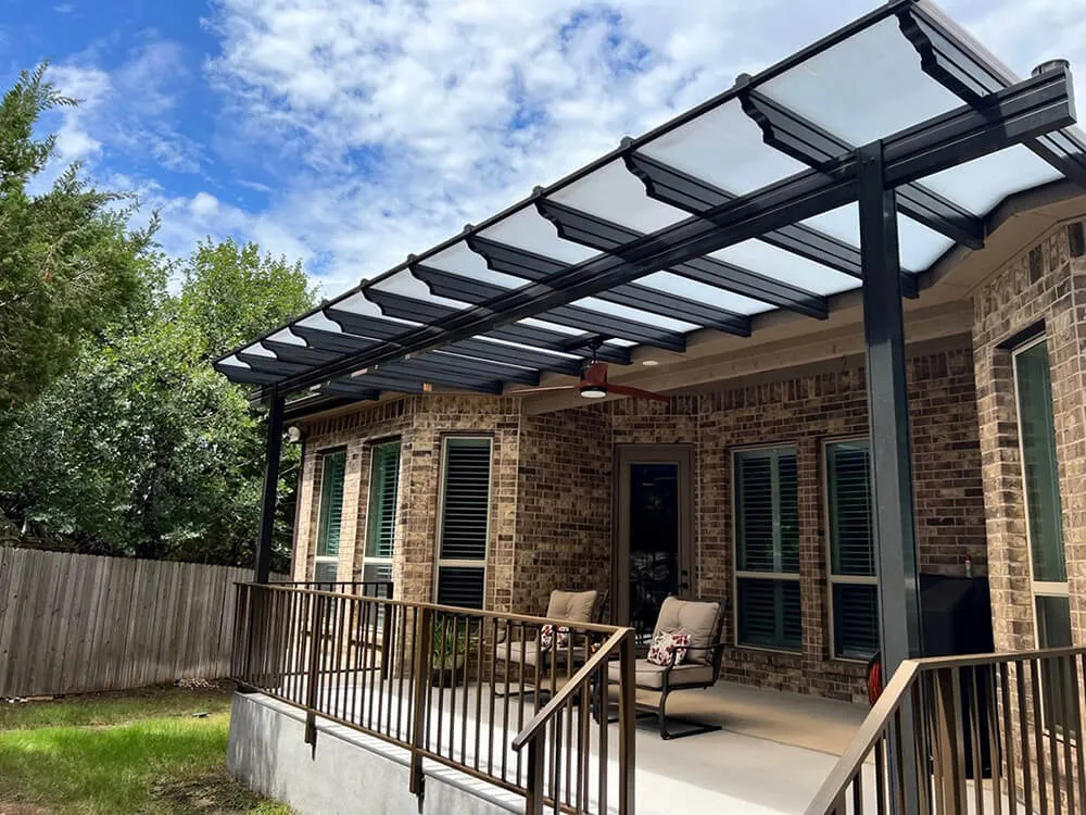 Modern pergola over patio with seating.