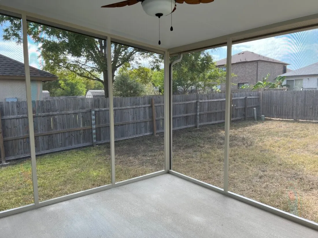 Screened patio with backyard view