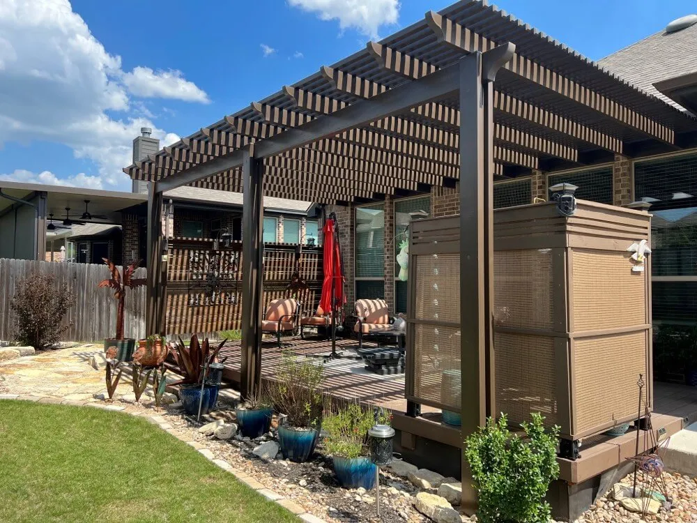 Backyard with wooden pergola in San Antonio.