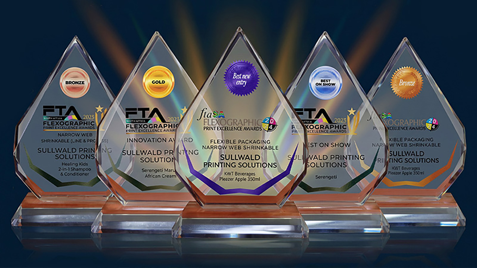 Five Flexographic Print Excellence Awards trophies from Sullwald Printing Solutions for 2023 and 2024.