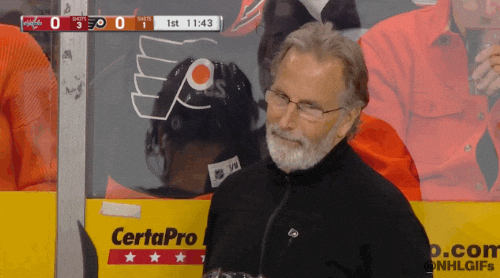 nhl hockey coach shaking his head