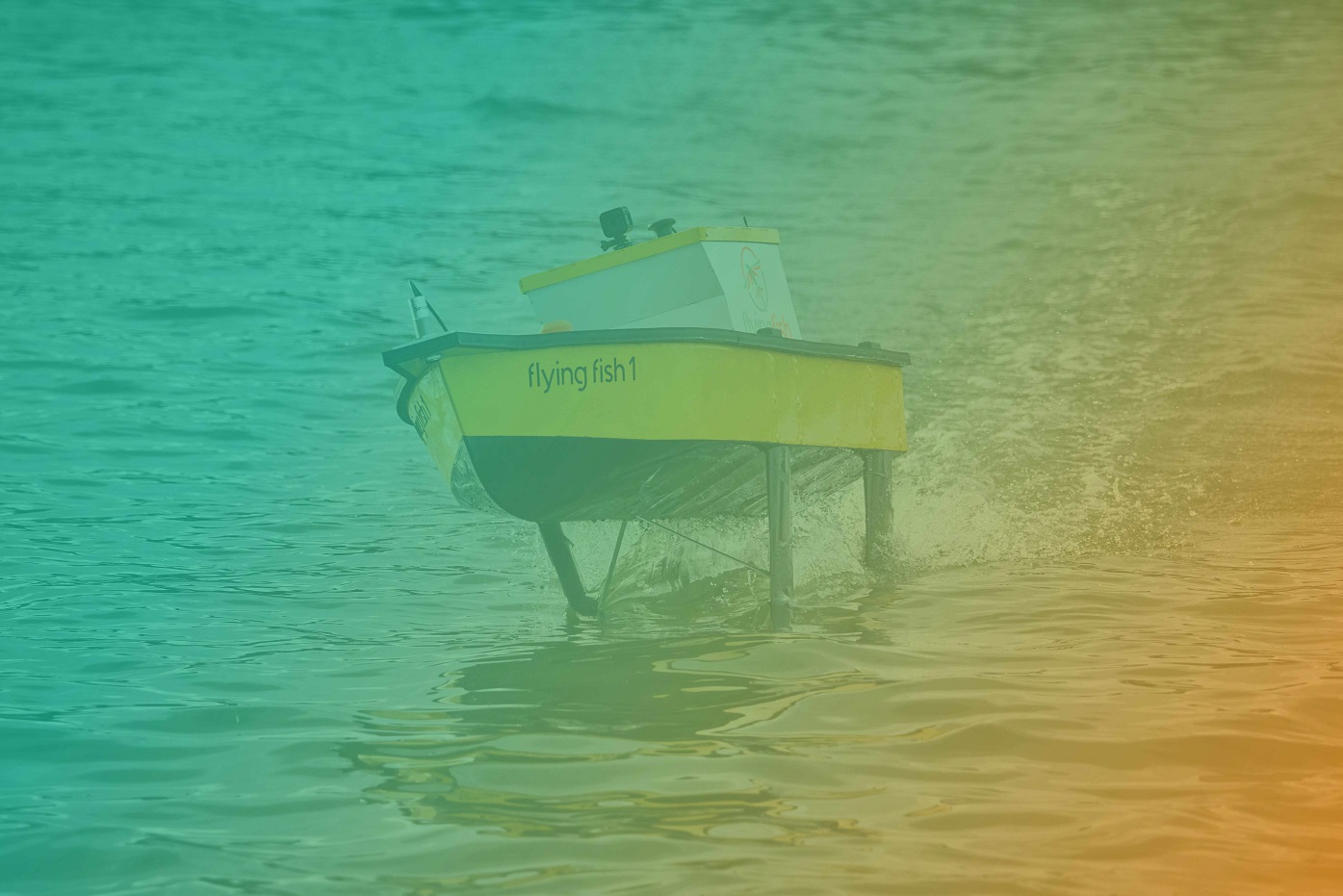 Photo of the Flying Fish 1 hydrofoil demonstrator boat in action.