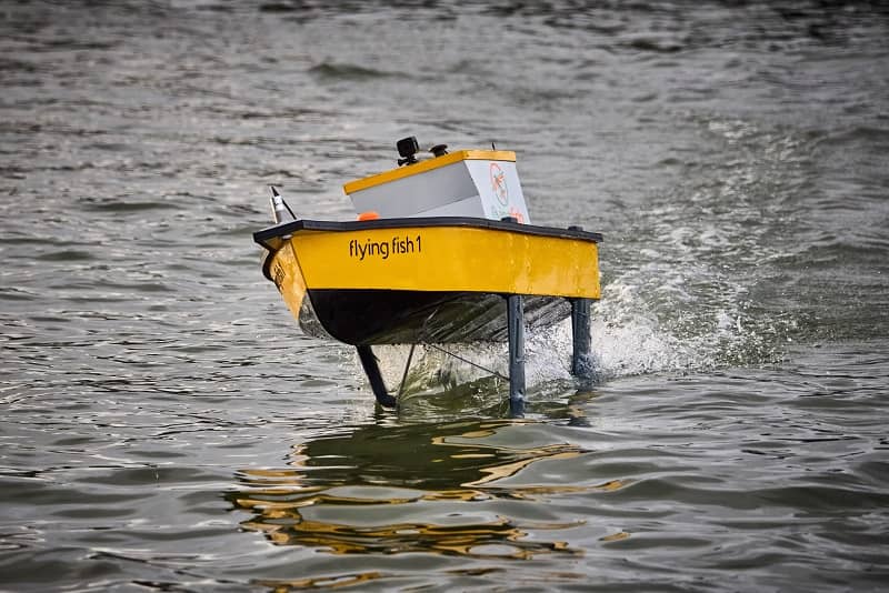 Picture of the Flying FIsh 1 hydrofoil demonstrator boat in action.