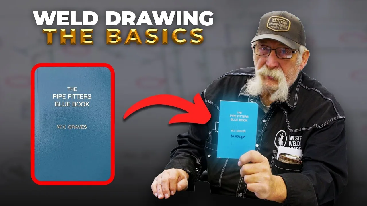 Western Welding Academy instructor holding The Pipe Fitters Blue Book in the Weld Drawing: The Basics video