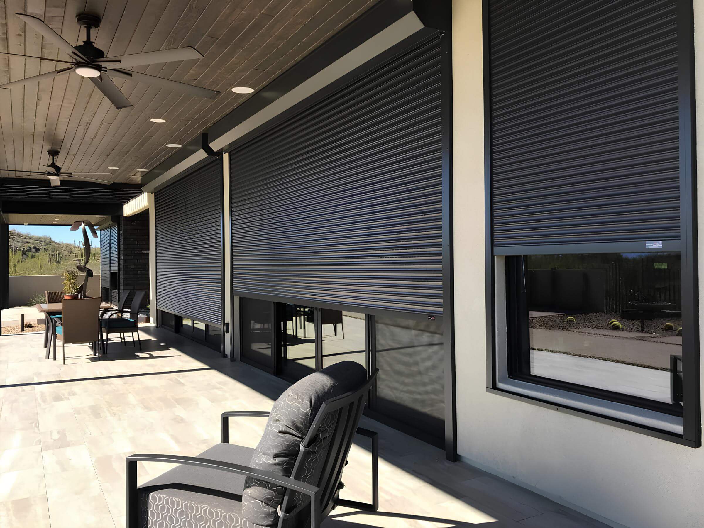 Patio with closed motorized rolling shutters.