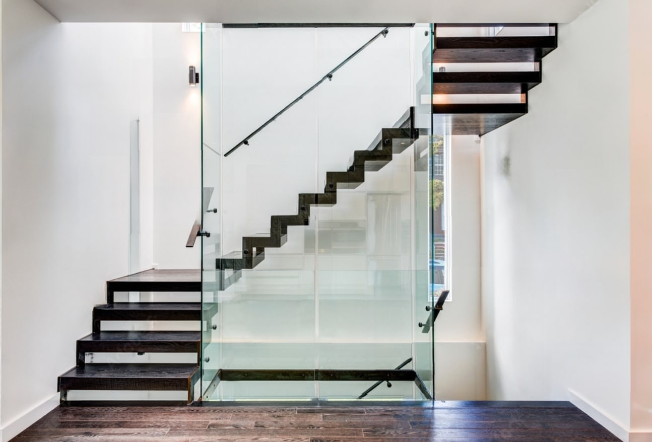 Sleek modern staircase with glass railing