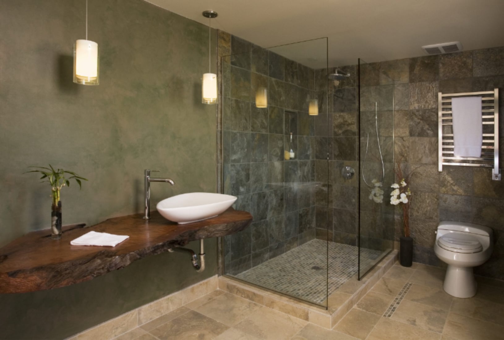 Modern bathroom with stone tile shower.