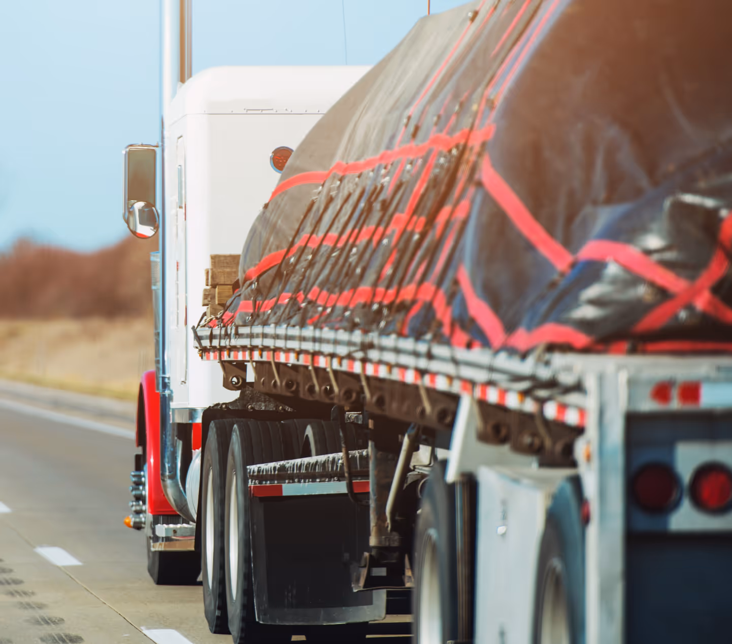 A heavy-duty truck transporting cargo on the highway