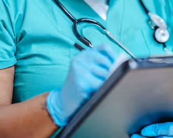 Nurse holding a clipboard