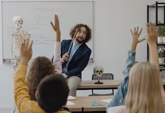Teacher in front of a classroom