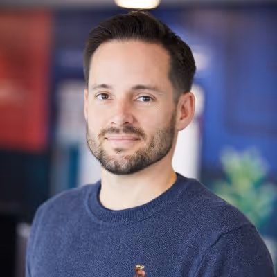 Headshot of Adam Dicker, Employee benefits Manager, Flight Centre