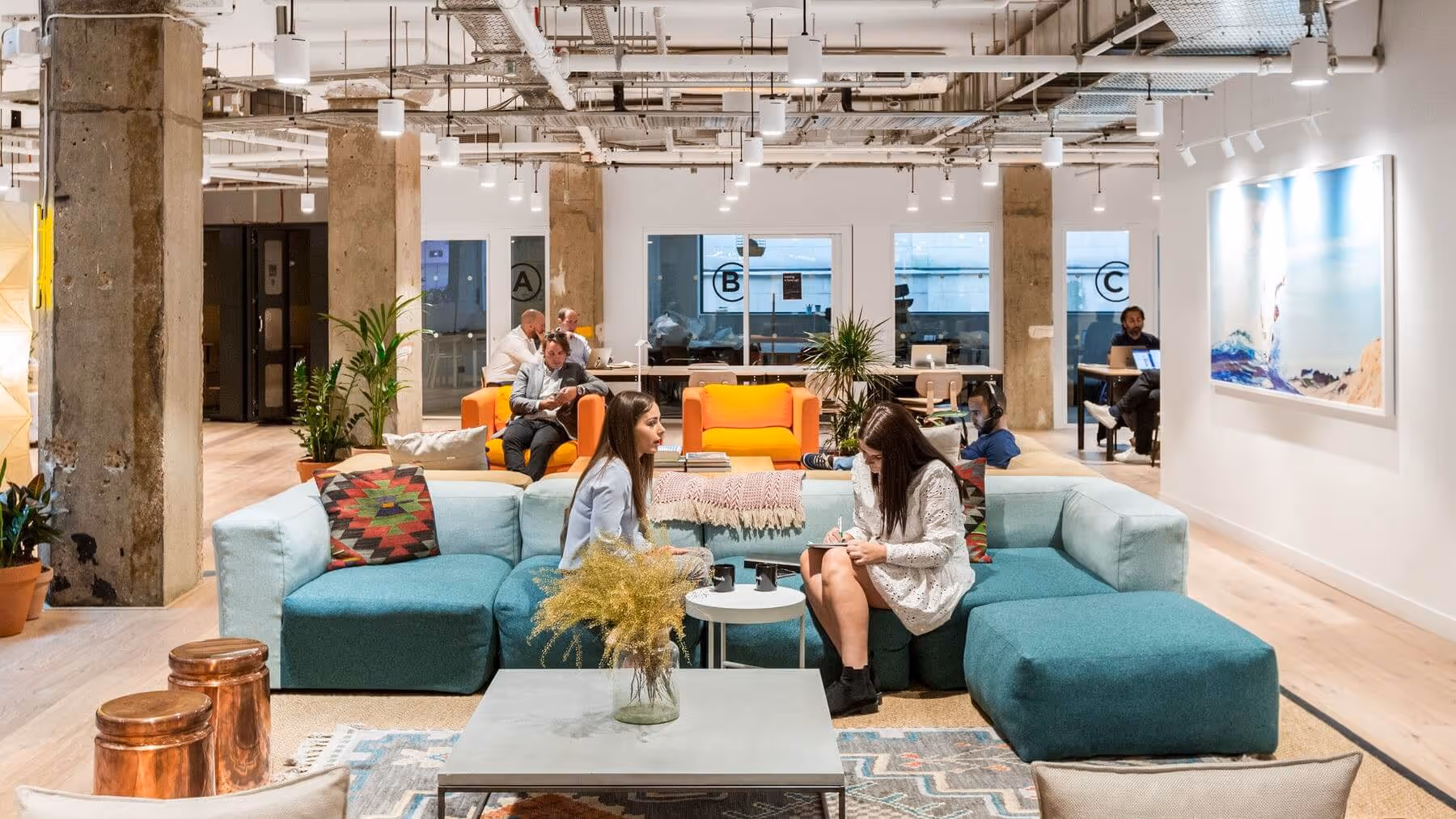 People working together in coworking space 
