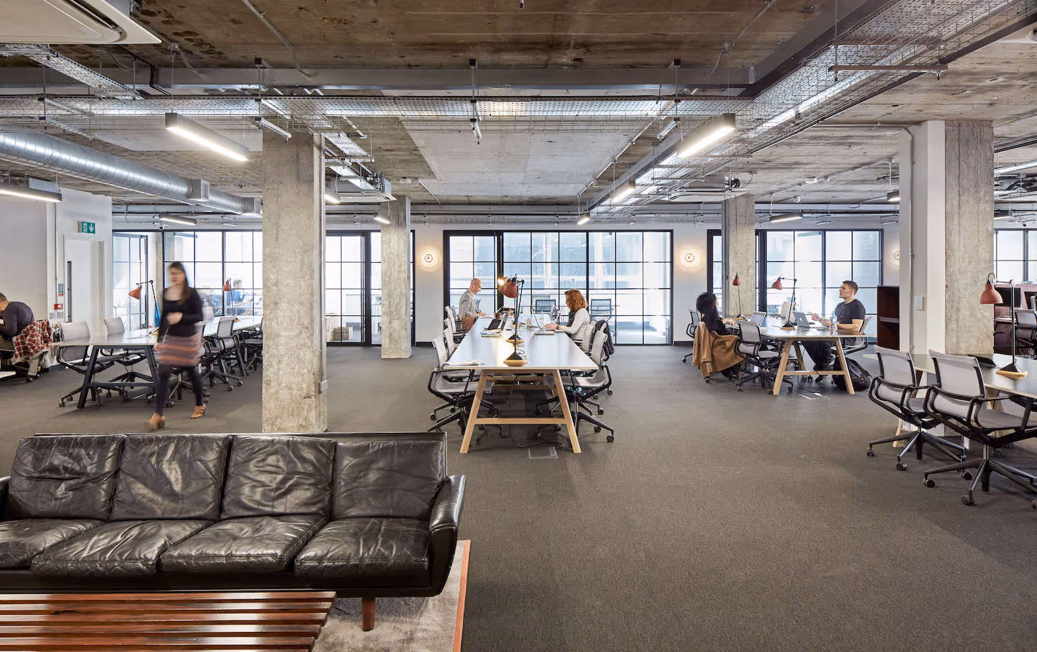 Business employees working in a private office space 