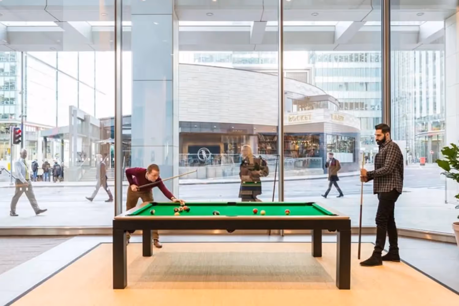 People playing pool in serviced office space in London