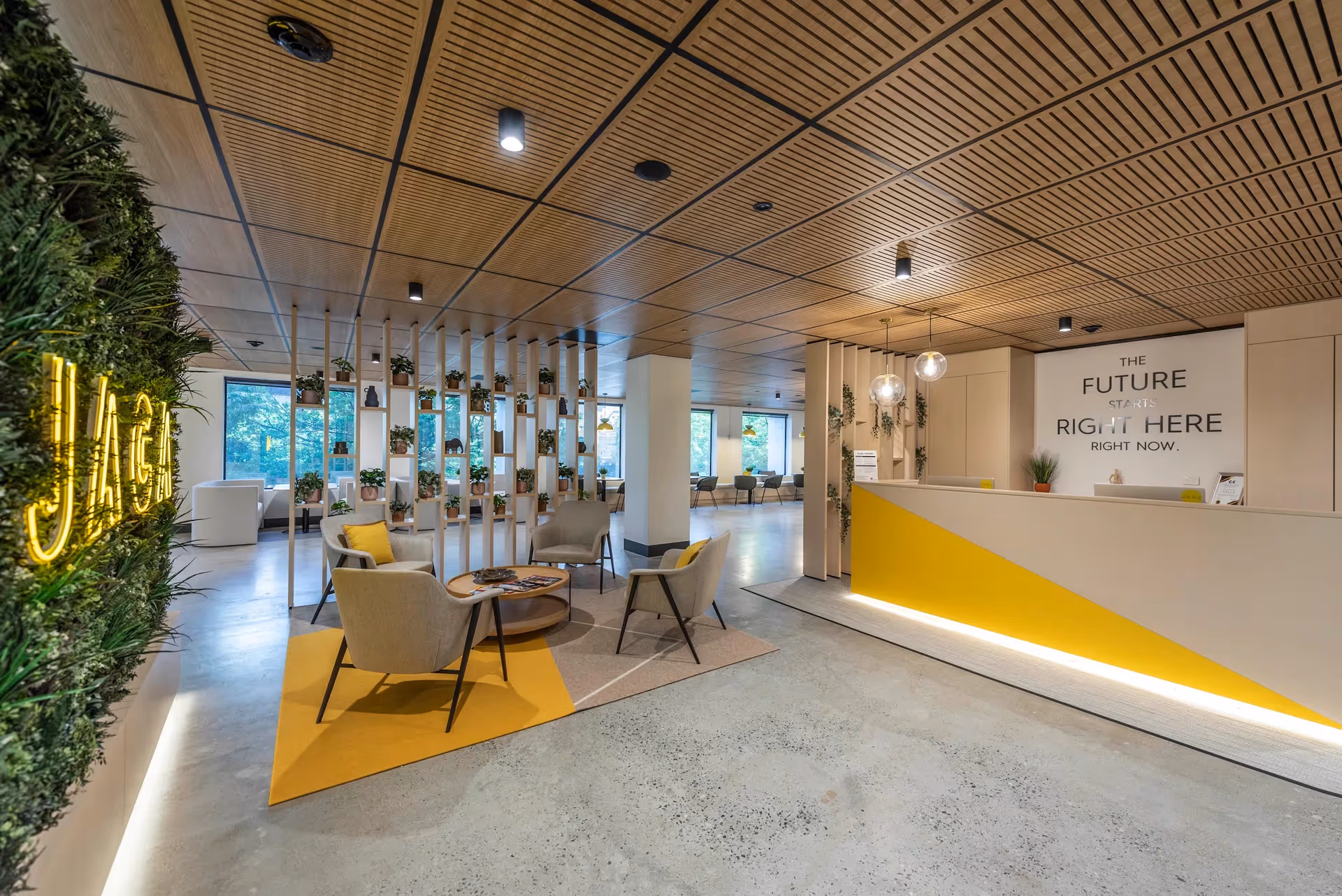 A well-lit reception area of a serviced office space in Brisbane.