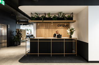 Cirque by Centuria's logo can be seen behind a welcoming reception desk at their Sydney office space.