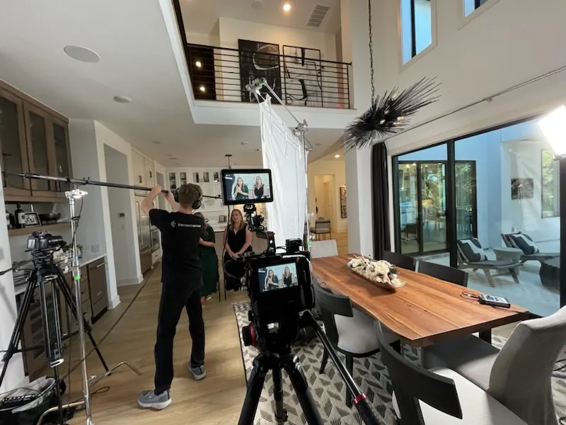 Videographer filming a session on location