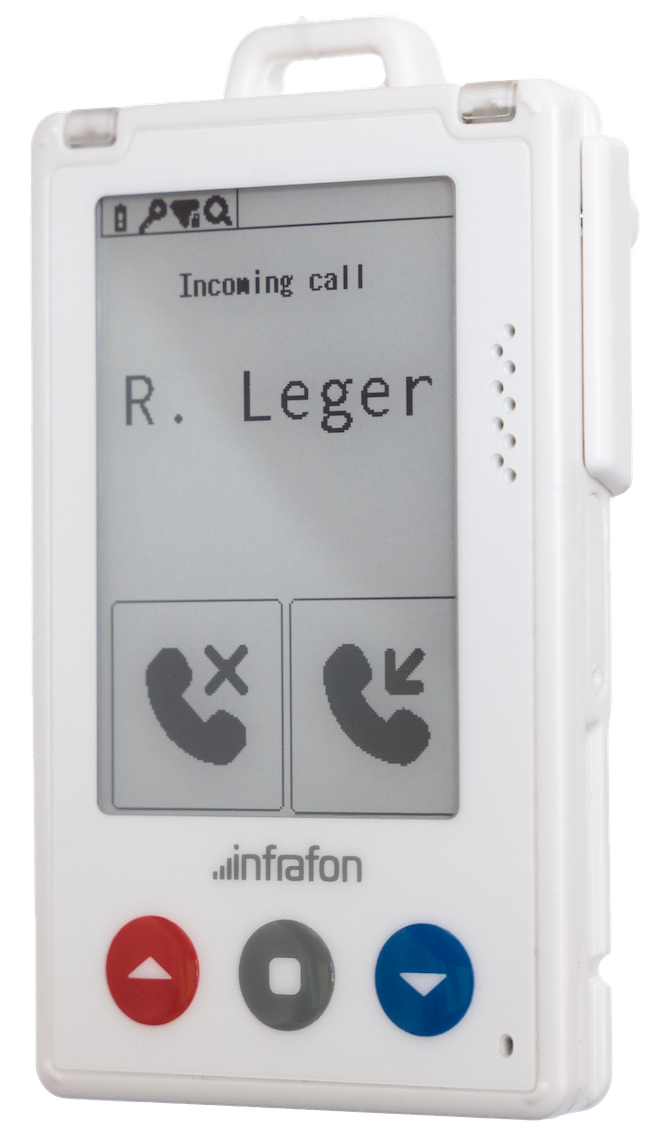 A hand holding the Infrafon CC2, used as a smart badge in a healthcare IoT setting