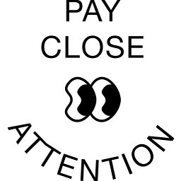 Pay Close Attention logo