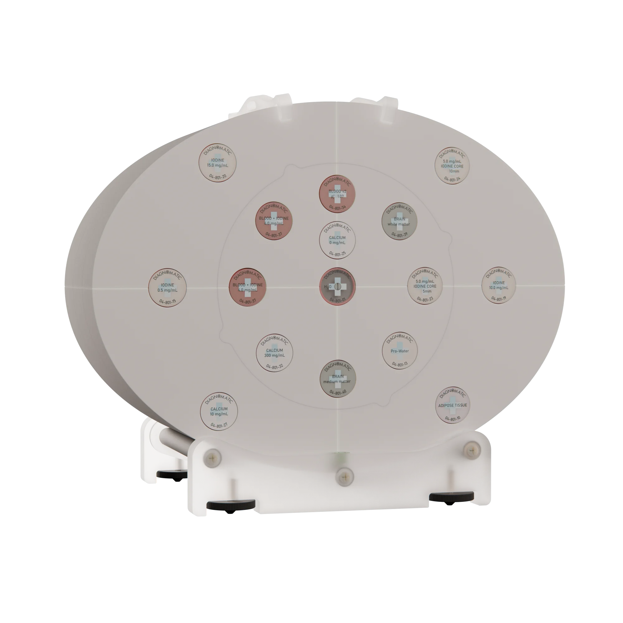 Fantom Pro-CT MultiEnergy na stojaku stołowym, eliptyczny korpus z centralnym modułem głowy i oznaczonymi wkładkami jodowymi, wapniowymi, krwiopodobnymi i tkankopodobnymi.