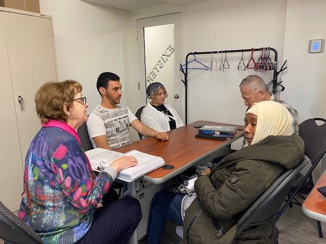volunteers with santa claus