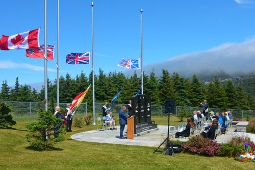 people at a veterans memorial in Outer Cove Newfoundland