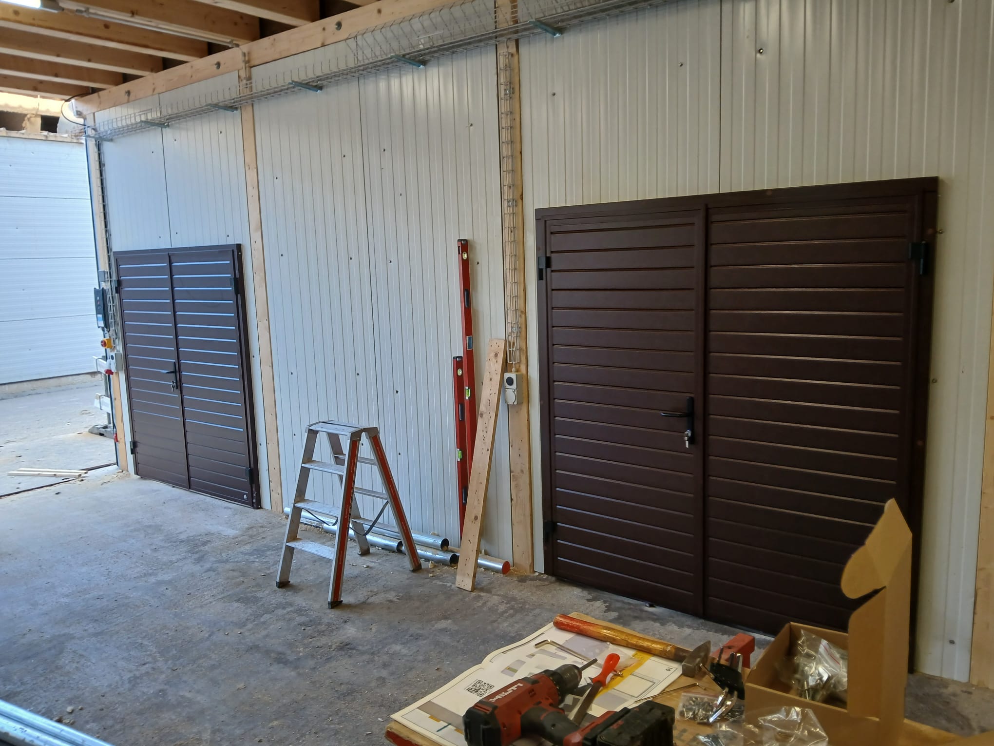 Portes battantes et porte à enroulement