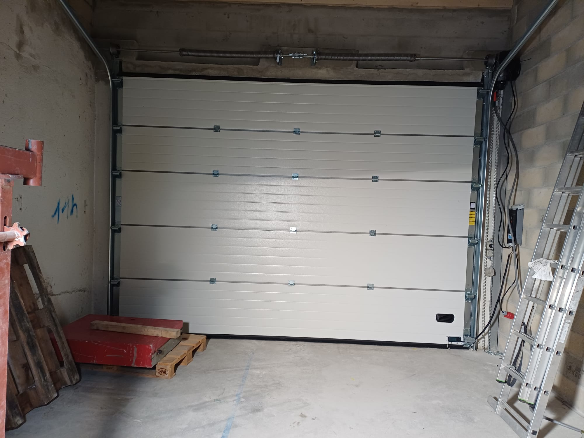 Installation d'une porte sectionnelle