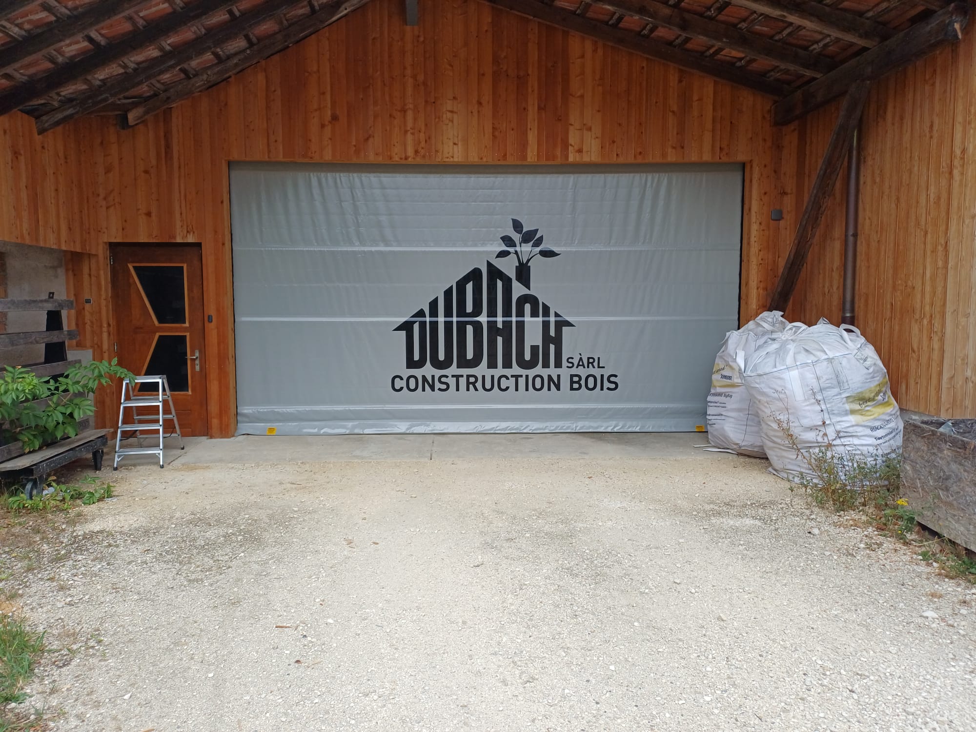 Remplacement bâche porte à enroulement