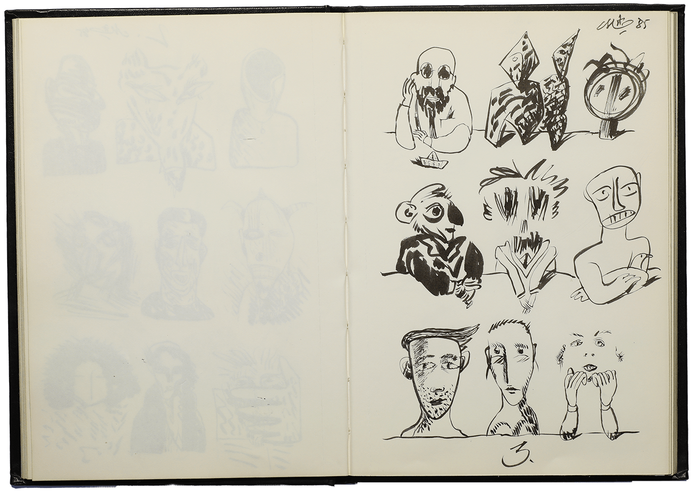 taccuino con disegni di volti