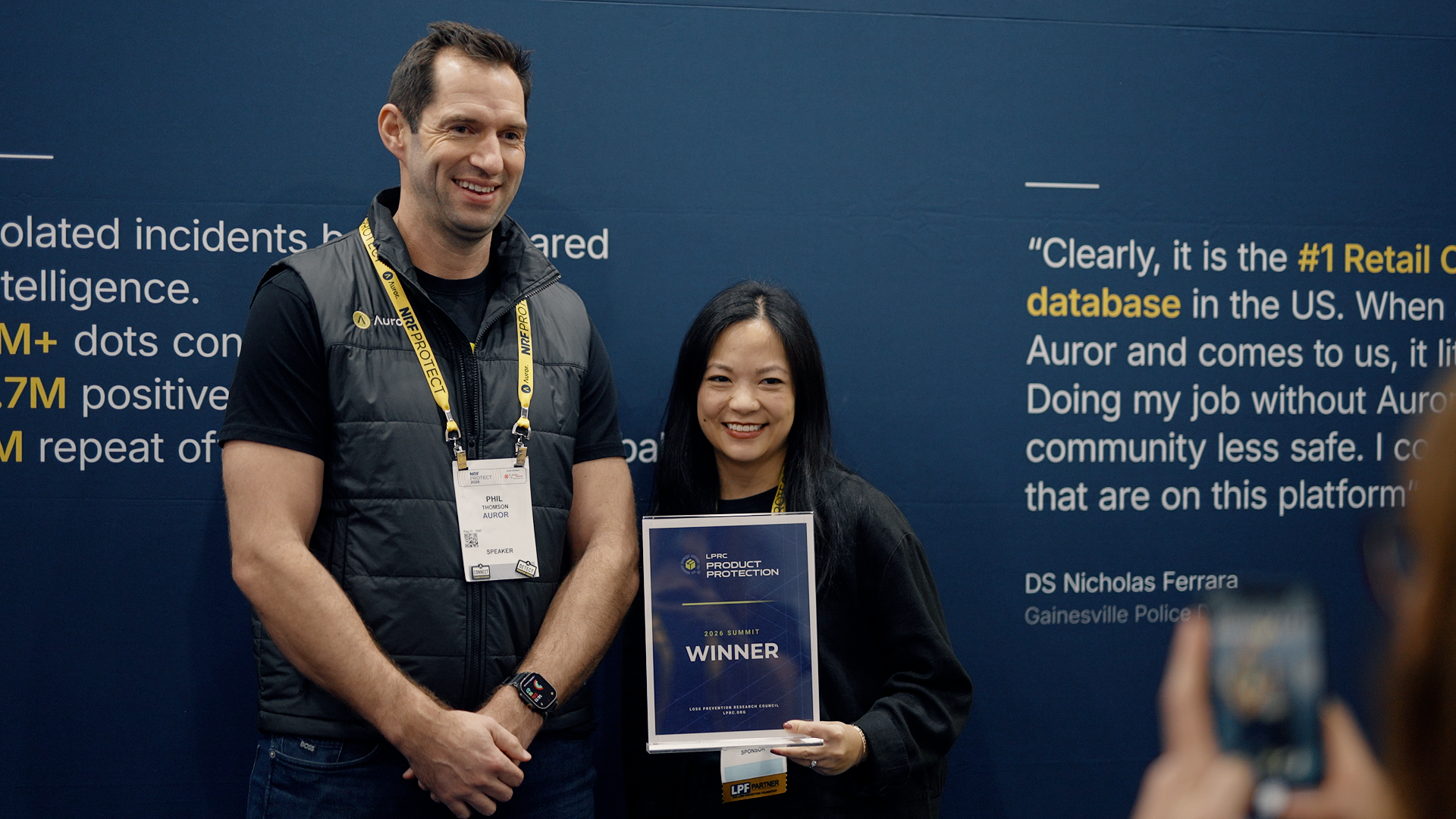 Auror CEO and co-founder Phil Thomson and Director of Product Marketing Jo Stanyer accept this year's LPRC Product Protection Summit Award.