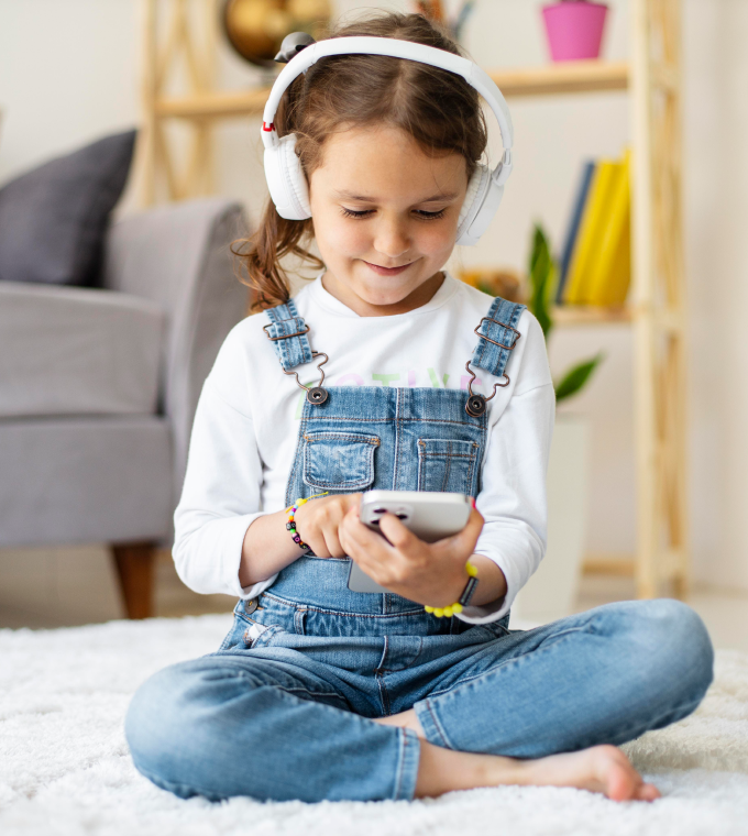 girl and guy aresmiling and  listening to music 