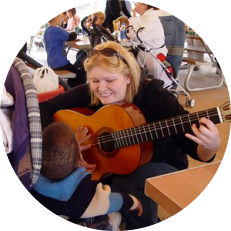 Music therapist playing guitar