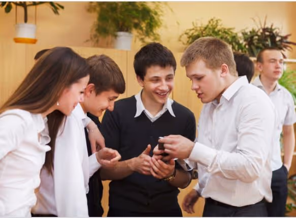 A group of young students communicating