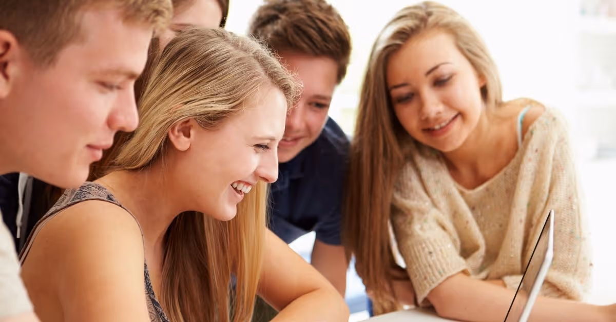 A group of young students communicating