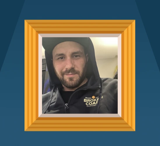 A headshot of James Batchelor, one of July's Budtender Spotlight winners.