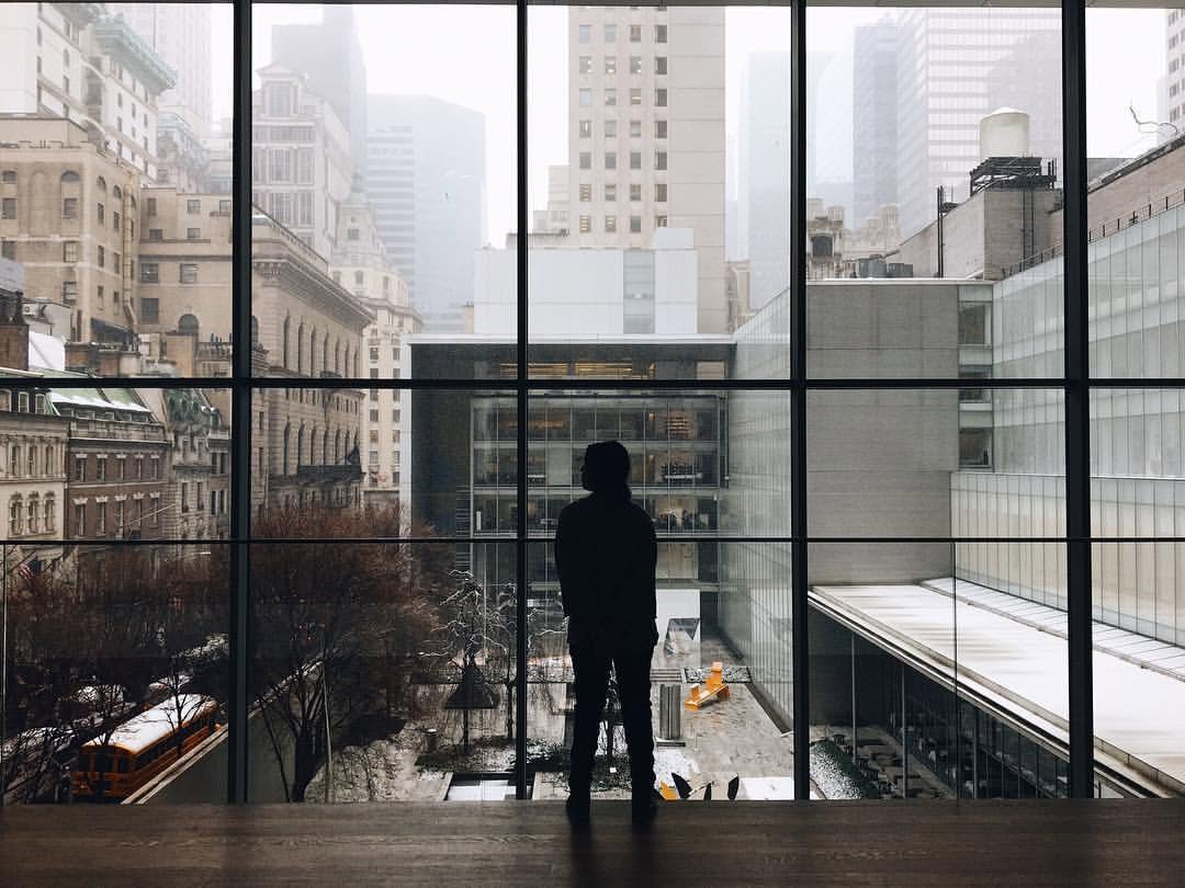 Natasha Brito silhouetted in her office at Sony Music Entertainment, where she served as Creative Director leading visual identity campaigns for developing and established artists