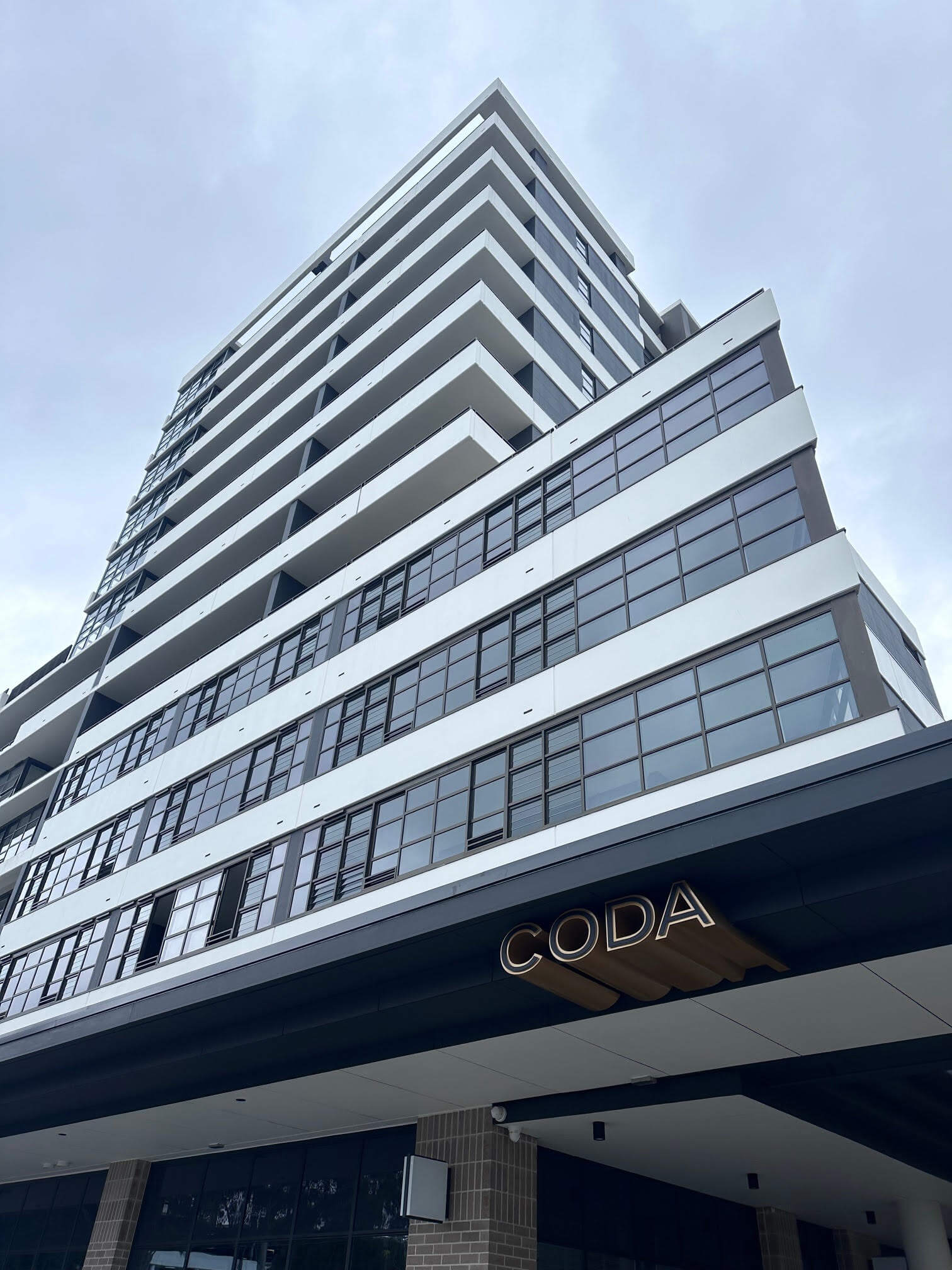 Looking up towards a high rise building in Coffs Harbour. Looking for a SMSF loan?