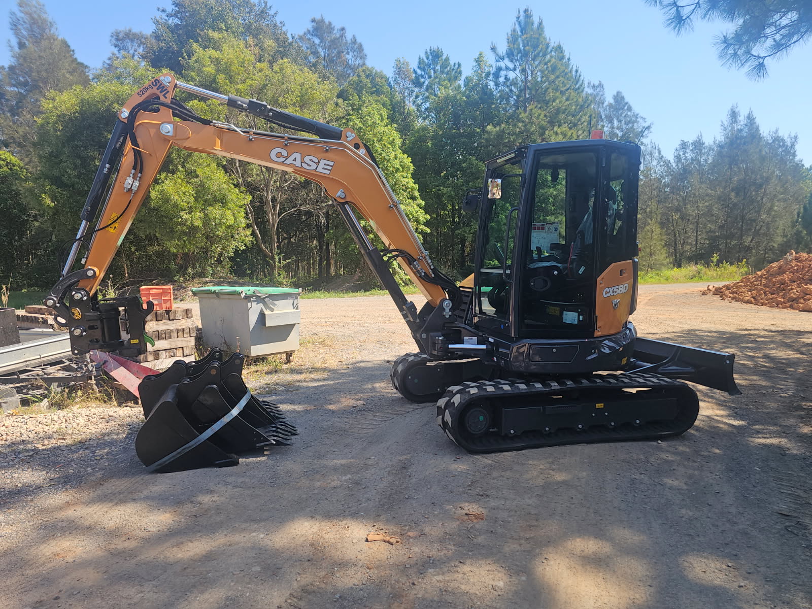 A new yellow excavator with finance sorted by North Coast Lending