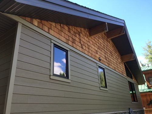 New Shake and Vinyl siding combo installation on a residential home in Red Deer courtesy of Epic Roofing & Exteriors