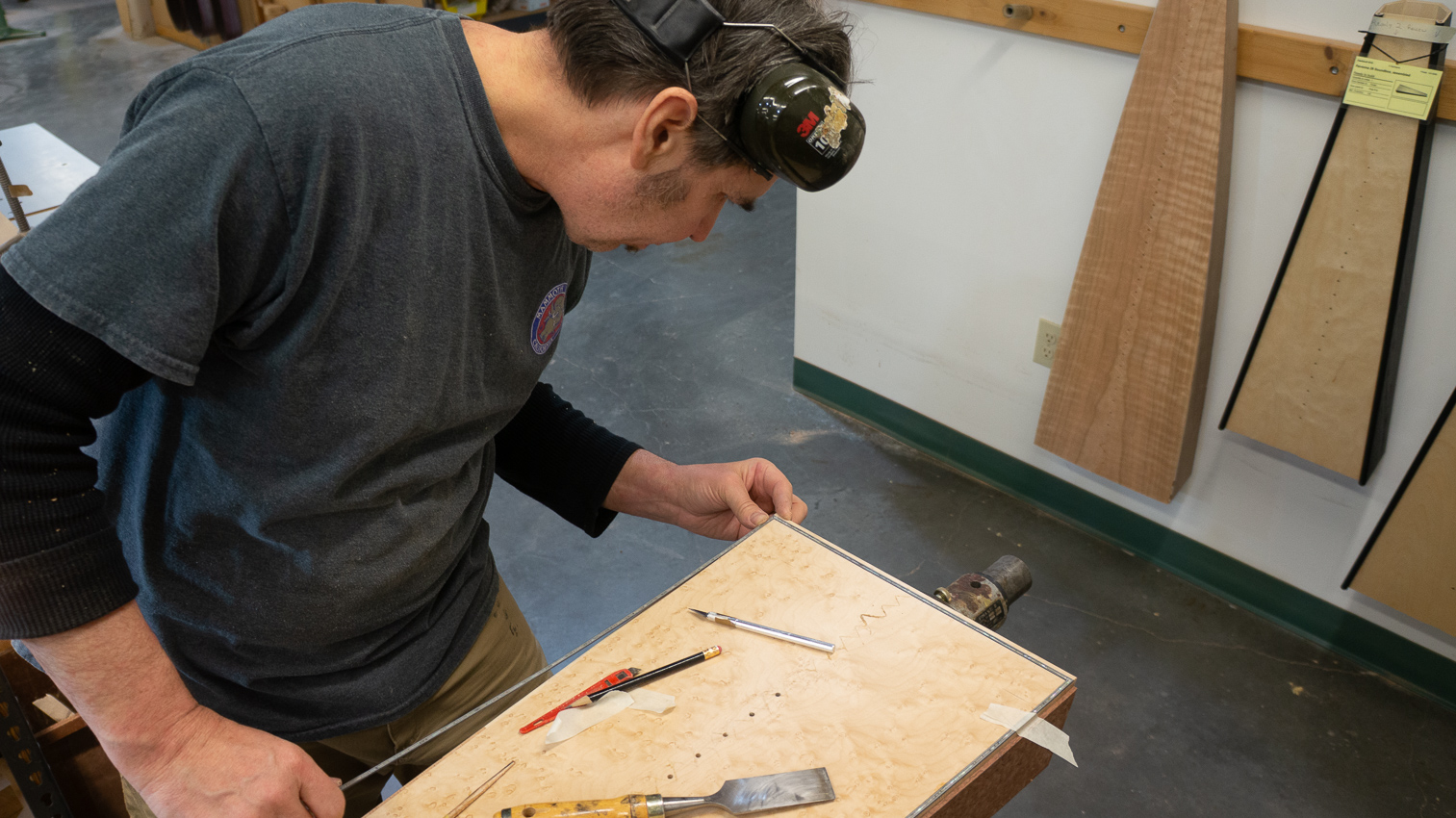 Inlaying abalone strips around the soundboard