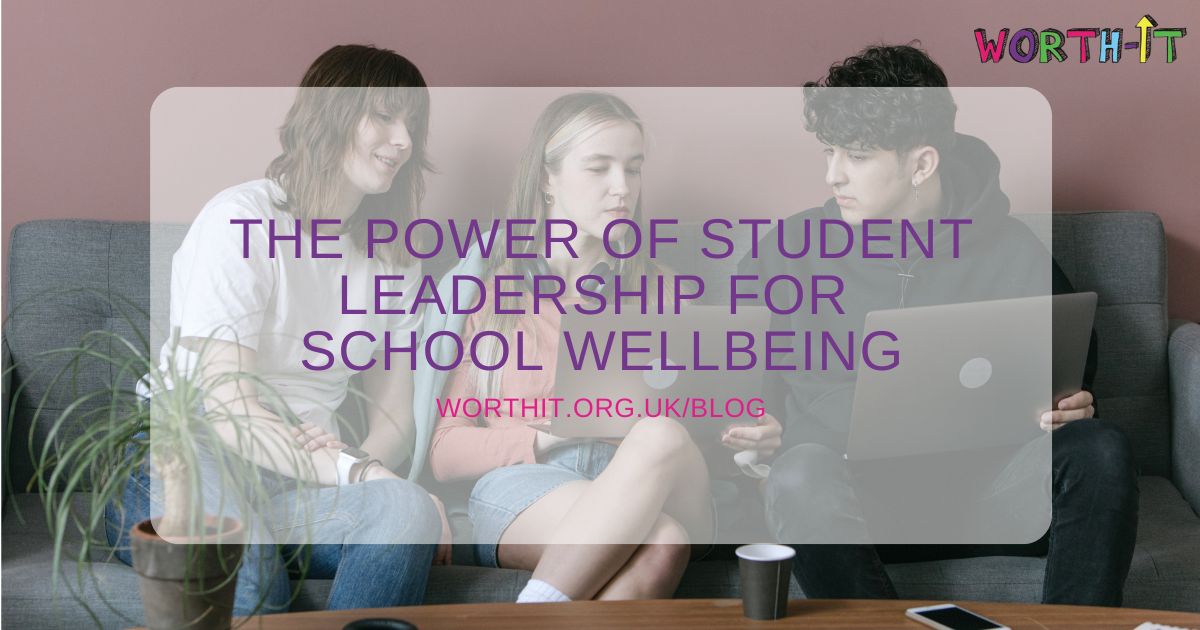 group of three student leaders with lap tops