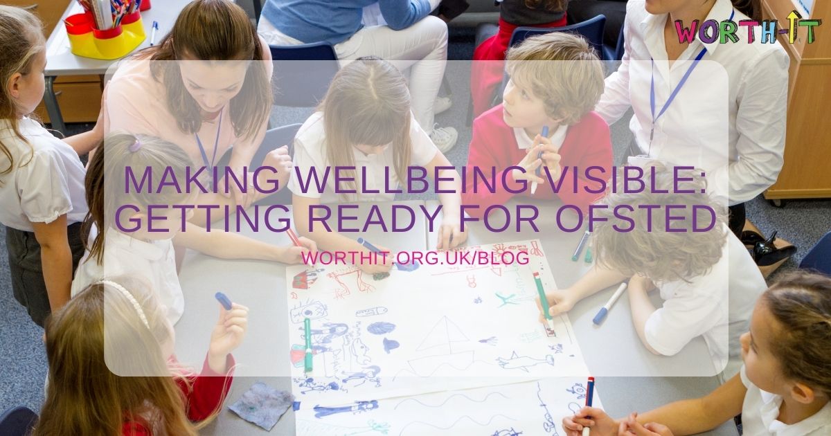 primary school children drawing a wellbeing picture with teachers