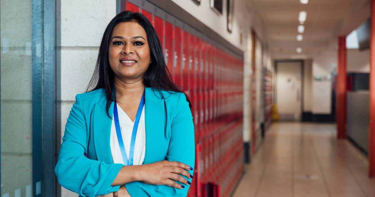 school leader in an empty school building
